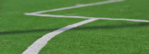 Synthetic grass surfaces